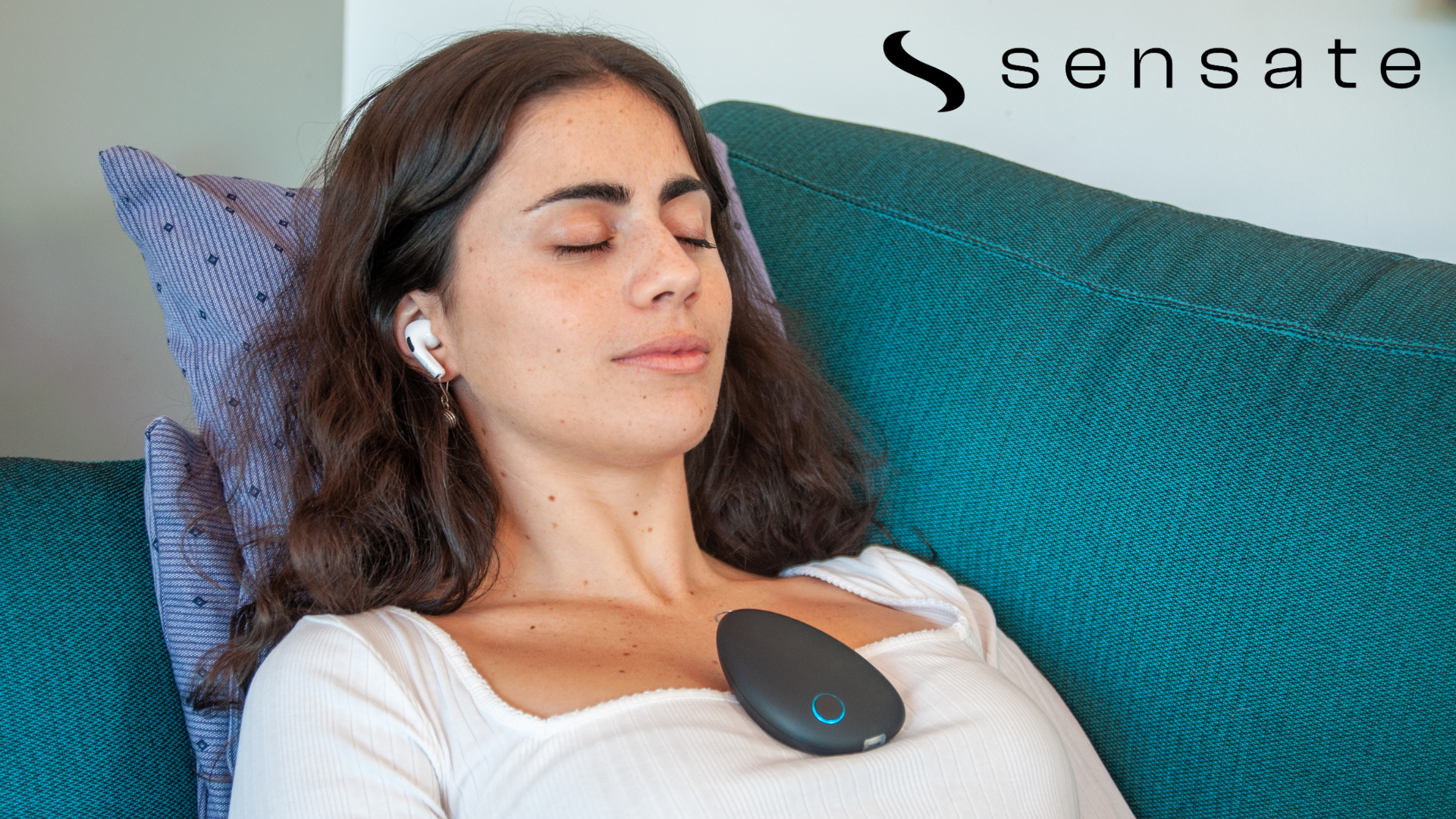 Image of person using Sensate on their chest to relax